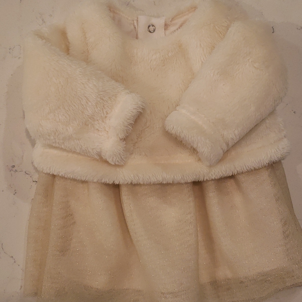 Fur and gold tulle dress